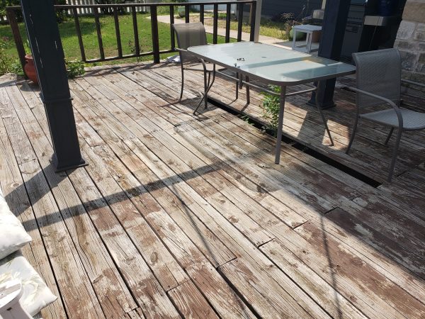 removing rotted wooden deck boards 